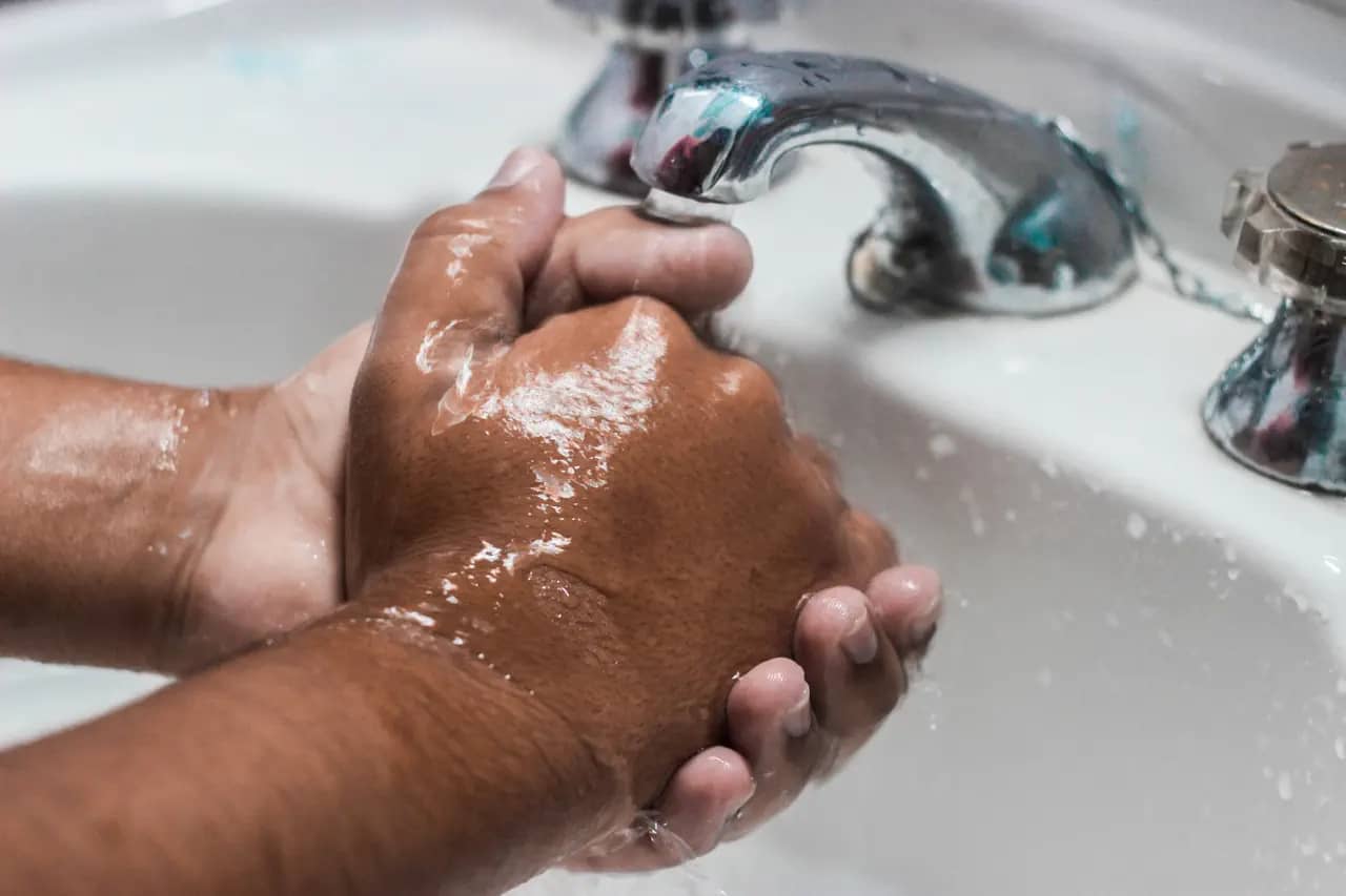 mysophobia - washing hands in sink