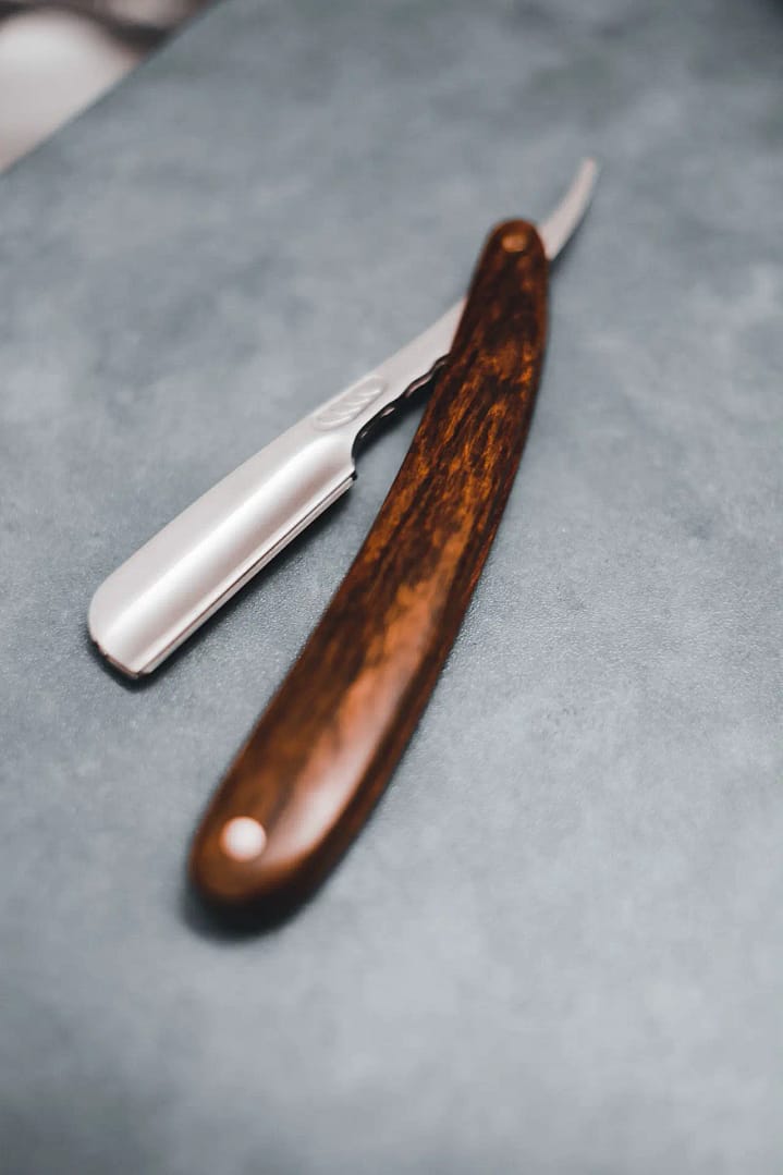 straight razor with a wooden handle